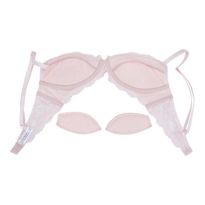 Pink bra set with straps on a white background